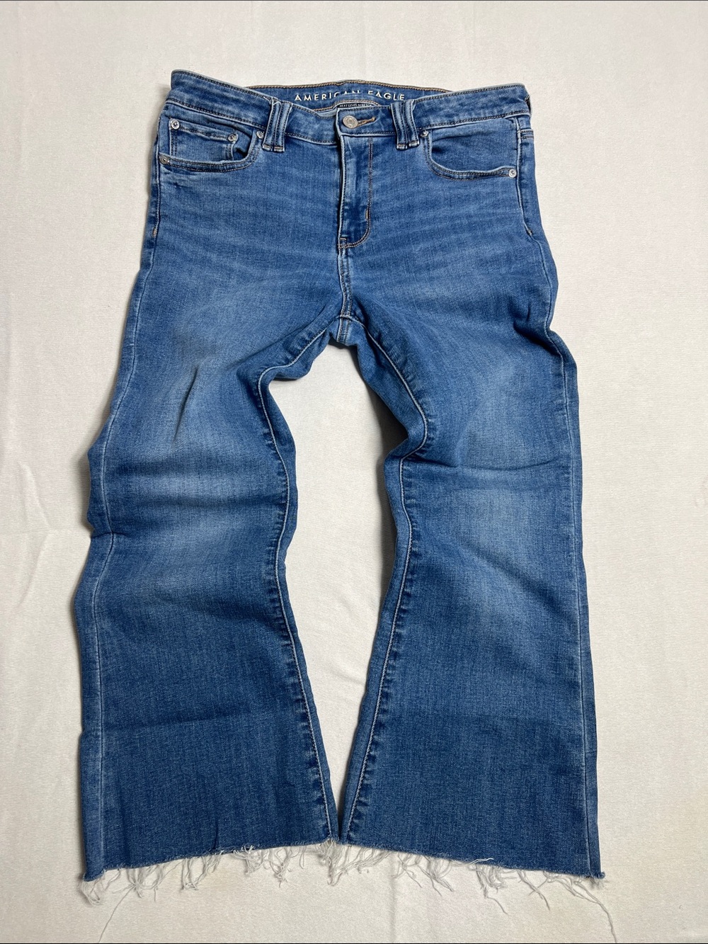American Eagle Outfitters women’s Bootcut cropped Jeans in Medium Blue Wash